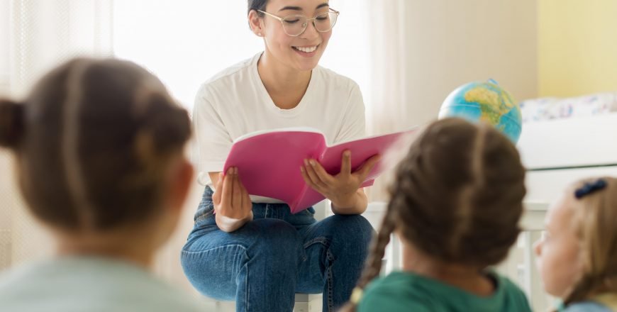 front-view-woman-reading-something-her-students