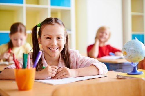 girl-with-big-smile-classroom